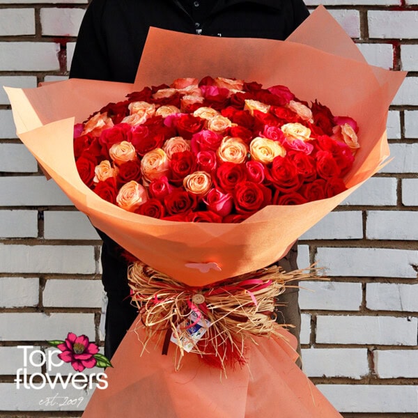 101 Red, Cyclamen, and Peach Roses | Bouquet