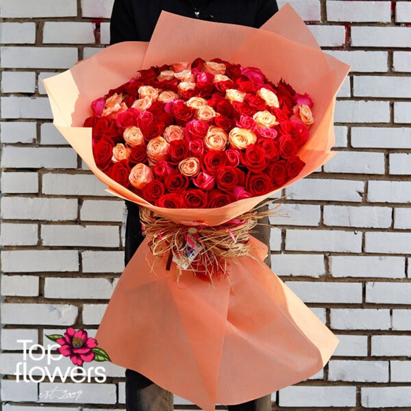 101 Red, Cyclamen, and Peach Roses | Bouquet